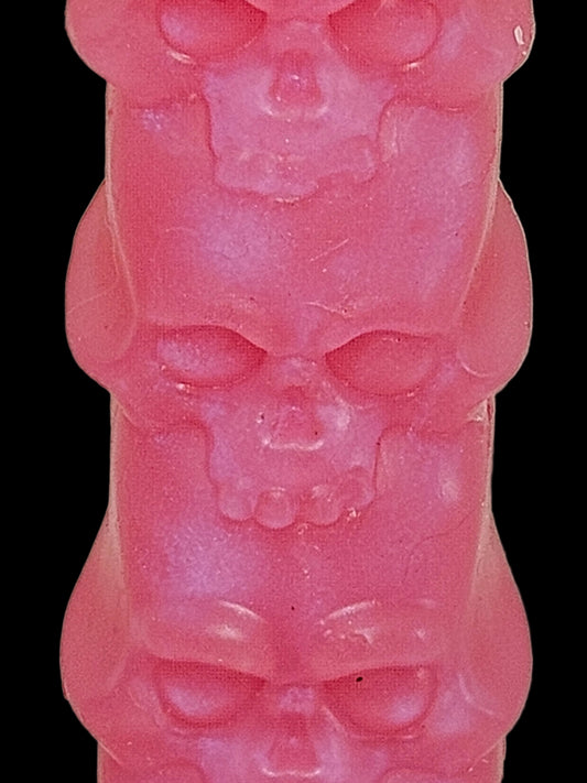 Close-up of a pink textured object on a beige background